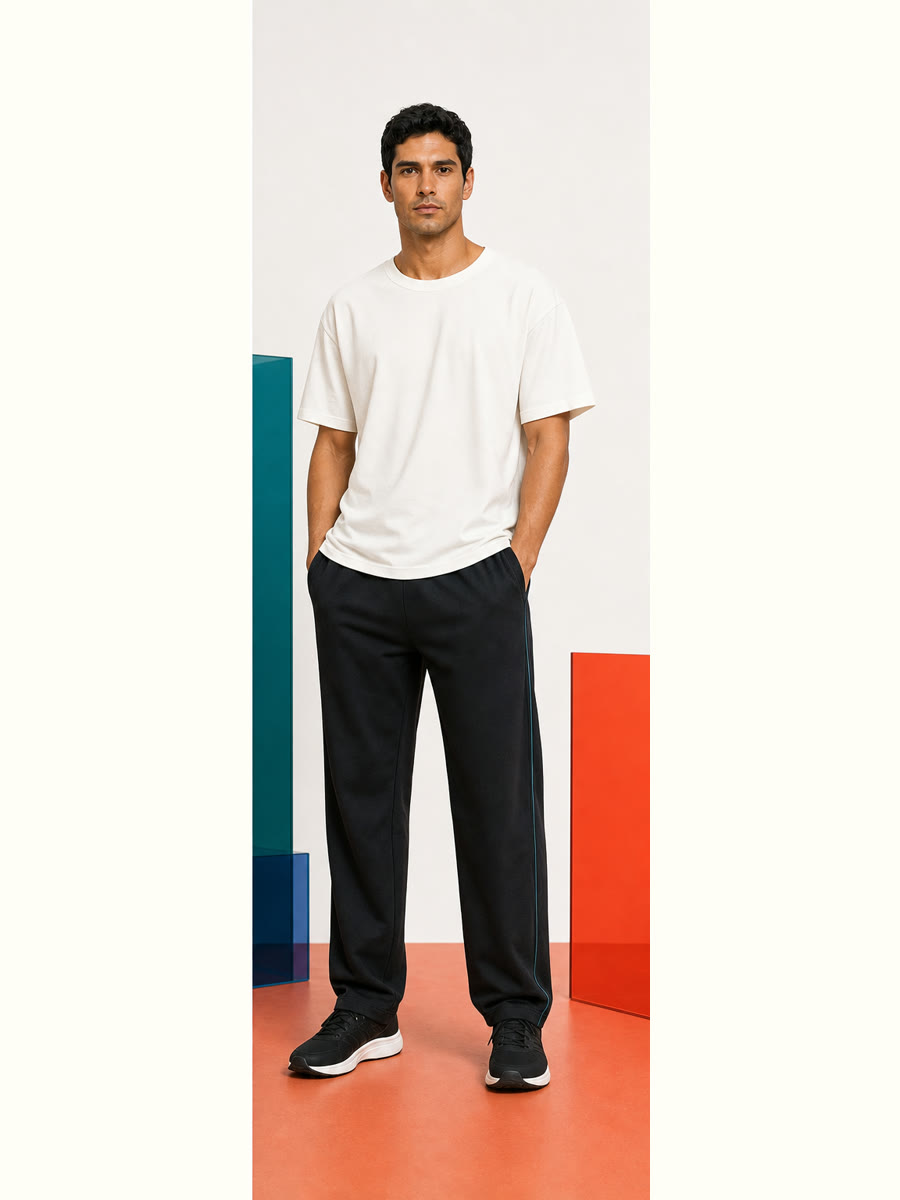 Field Notes track pants styled as a complete outfit in the Vervefolk studio.