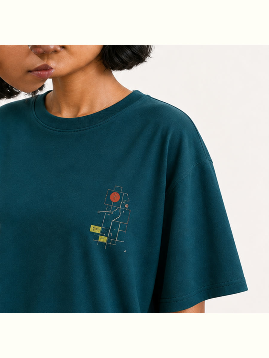 Field Notes In Motion Oversized Tee construction and print-detail close view.