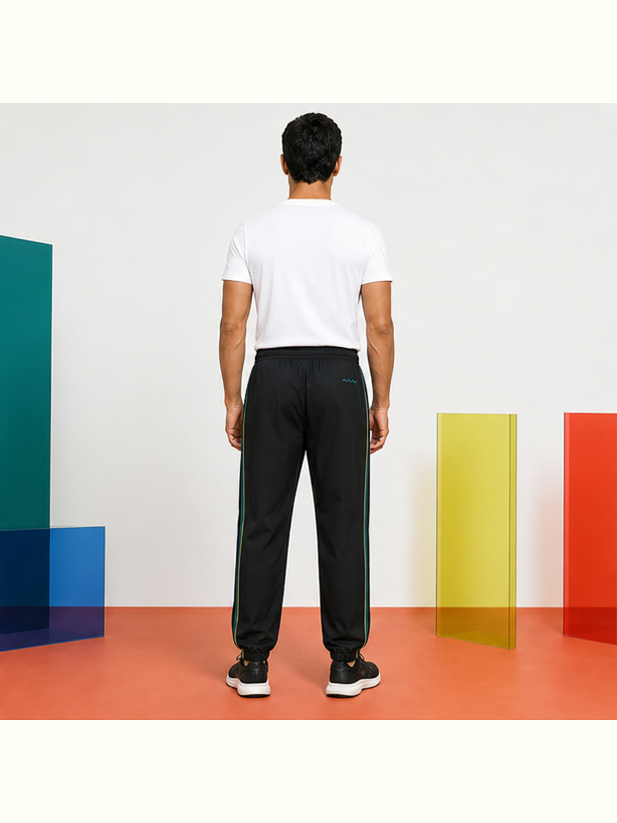 Field Notes Track Pants back view showing the main product treatment.